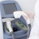 cropped shot of dermatologist with laser hair removal apparatus preparing for the session in a clinic